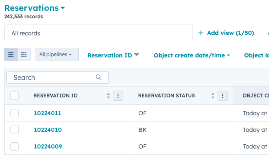 Booking system integration diagram showing guest and reservation data synced into HubSpot CRM